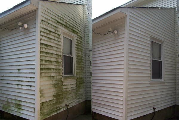 Before and after of a pressure-washed building, showing the difference in cleanliness.